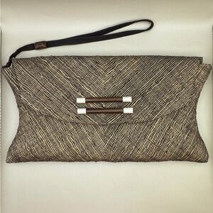 Artisan handcrafted envelope clutch woven black and beige with suede strap